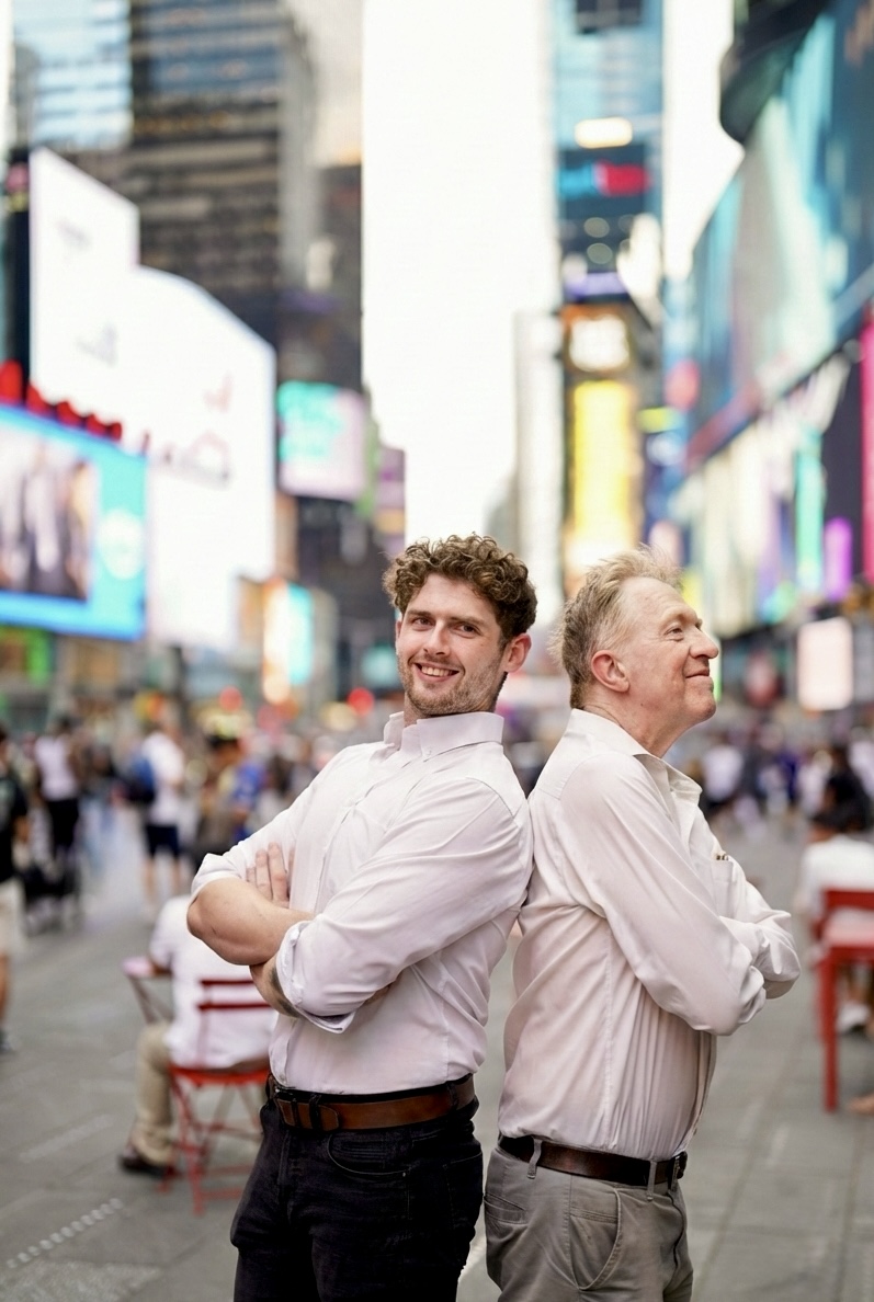 Drew Blaise grinning in Times Square